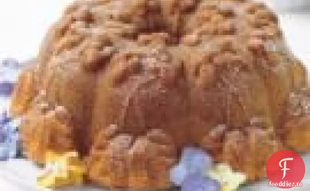 Tort Portocaliu Cu Glazură De Unt Maro