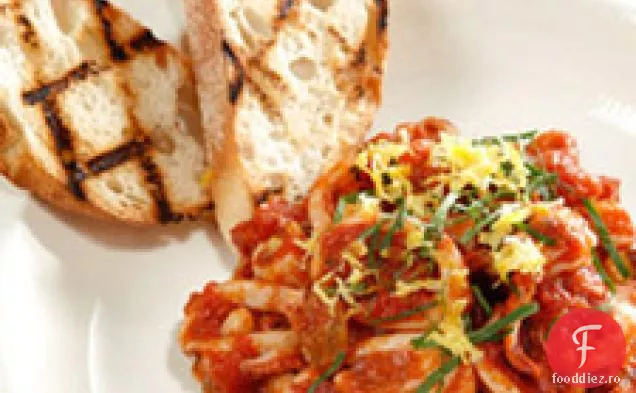 Calamari Sote Cu Roșii, Busuioc, Stafide Și Nuci De Pin