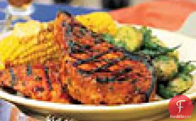 Pui și carne de porc la grătar cu glazură de portocale-chimen