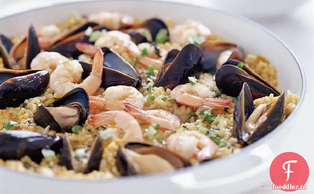 Paella cu fructe de mare cu spanac și Rucola