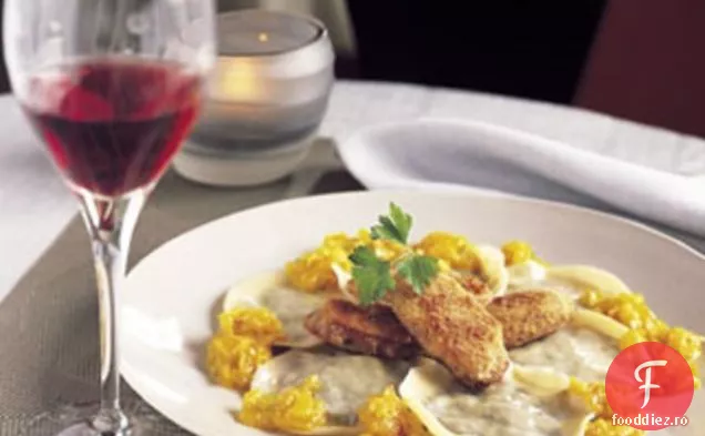 Ravioli de linte cu cârnați și sos de roșii galbene