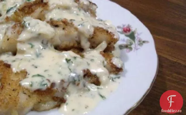 Cod afumat în sos de pătrunjel