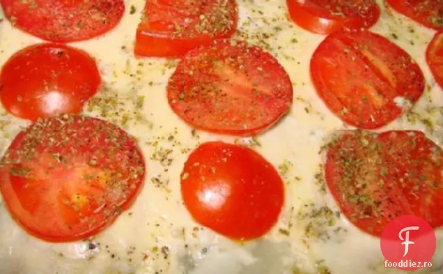 Pește unic la cuptor foarte ușor cu Mozzarella și roșii
