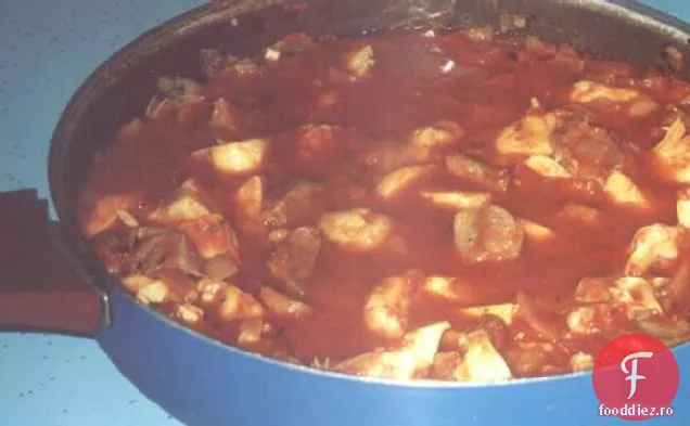 Tocană de miel, anghinare și roșii